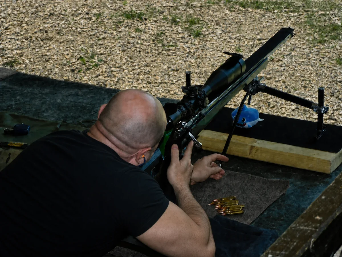 ARMAX founder Milan Veljkovic behind an F/TR precision rifle at the range